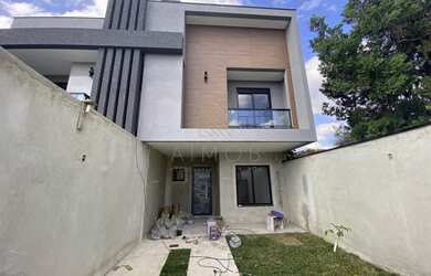 Imagem: A casa possui 3 Dormitórios, 3 Banheiros, 3 Vagas na garagem