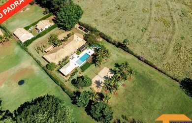 Imagem: A casa possui 3 Dormitórios, 5 Banheiros, 5 Vagas na garagem