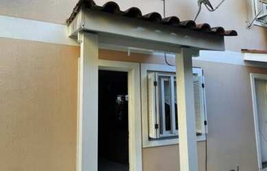 Imagem: A casa possui 2 Dormitórios, 1 Banheiro, 1 Vaga na garagem