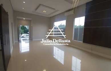 Imagem: A casa possui 3 Dormitórios, 5 Banheiros, 2 Vagas na garagem