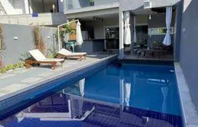 Imagem: A casa em condomínio possui 4 Dormitórios, 5 Banheiros, 2