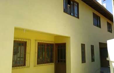 Imagem: A kitnet possui 2 Dormitórios, 1 Banheiro, 1 Vaga na garagem