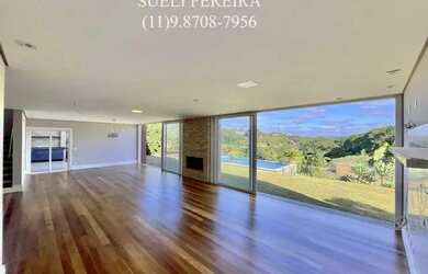 Imagem: A casa em condomínio possui 4 Dormitórios, 5 Banheiros, 5