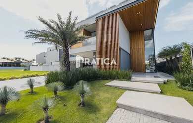 Imagem: A casa em condomínio possui 5 Dormitórios, 5 Banheiros, 4