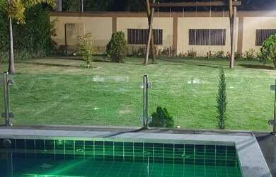 Imagem: A casa possui 5 Dormitórios, 5 Vagas na garagem e está localizado