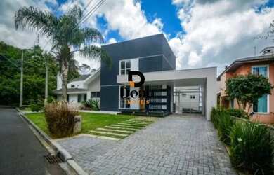 Imagem: A casa em condomínio possui 3 Dormitórios, 4 Banheiros, 5