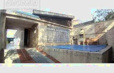 Imagem: A casa possui 2 Dormitórios, 4 Banheiros, 5 Vagas na garagem