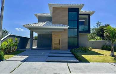 Imagem: A casa possui 3 Dormitórios, 2 Banheiros, 4 Vagas na garagem