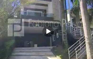 Imagem: A casa em condomínio possui 5 Dormitórios, 5 Banheiros, 4