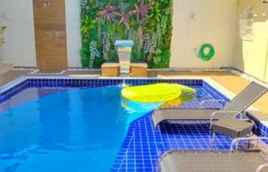 Imagem: A casa possui 3 Dormitórios, 2 Banheiros, 4 Vagas na garagem