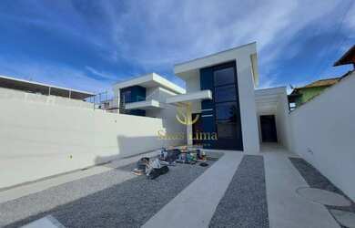 Imagem: A casa possui 3 Dormitórios, 2 Banheiros, 2 Vagas na garagem