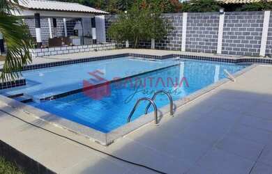 Imagem: A casa em condomínio possui 4 Dormitórios, 3 Banheiros, 5