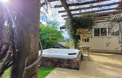 Imagem: A casa em condomínio possui 3 Dormitórios, 5 Banheiros, 4