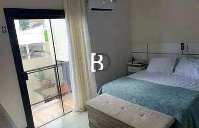 Imagem: A casa possui 4 Dormitórios, 5 Banheiros, 1 Vaga na garagem