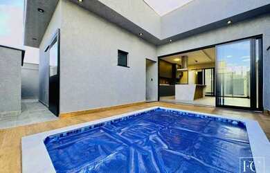 Imagem 14: Com uma fachada de tirar o fôlego, essa linda casa no Village Damha Rio...