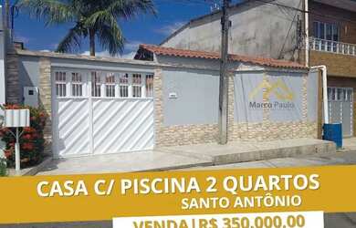 Imagem: A casa possui 2 Dormitórios, 3 Banheiros, 4 Vagas na garagem