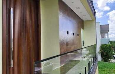 Imagem: A casa possui 3 Dormitórios, 5 Banheiros, 2 Vagas na garagem