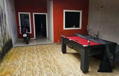 Imagem: A casa possui 4 Dormitórios, 3 Banheiros, 3 Vagas na garagem