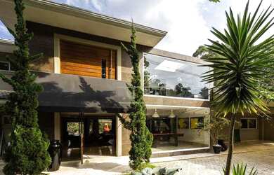 Imagem: A casa em condomínio possui 5 Dormitórios, 5 Banheiros, 5