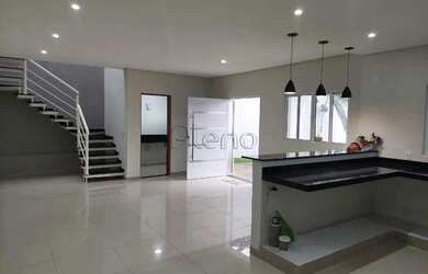 Imagem: A casa possui 3 Dormitórios, 3 Banheiros, 4 Vagas na garagem