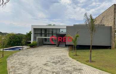 Imagem: A casa em condomínio possui 5 Dormitórios, 5 Banheiros, 5