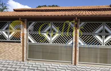 Imagem: A casa possui 3 Dormitórios, 2 Banheiros, 3 Vagas na garagem