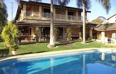 Imagem: A casa em condomínio possui 5 Dormitórios, 5 Banheiros, 5