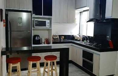 Imagem: A casa possui 3 Dormitórios, 2 Banheiros, 3 Vagas na garagem