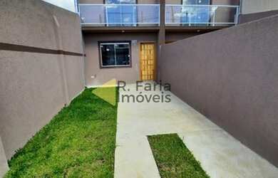 Imagem: A casa possui 2 Dormitórios, 2 Banheiros, 2 Vagas na garagem