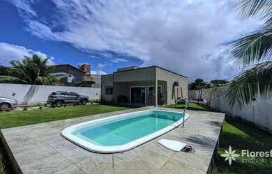 Imagem: A casa possui 3 Dormitórios, 3 Banheiros, 3 Vagas na garagem