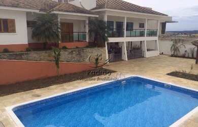 Imagem: A casa em condomínio possui 4 Dormitórios, 5 Banheiros, 5