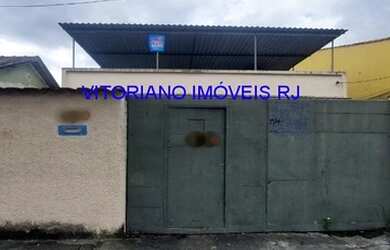 Imagem: A casa possui 3 Dormitórios, 3 Banheiros, 3 Vagas na garagem