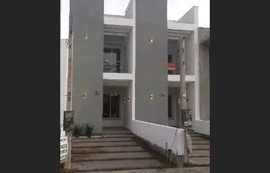 Imagem: A casa possui 2 Dormitórios, 3 Banheiros, 1 Vaga na garagem