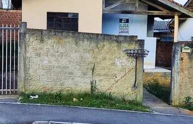 Imagem: A casa possui 2 Dormitórios, 1 Banheiro, 1 Vaga na garagem