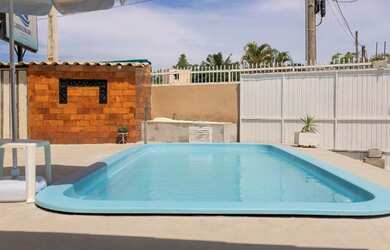 Imagem: A casa possui 3 Dormitórios, 3 Vagas na garagem e está localizado