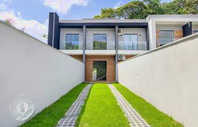 Imagem: A casa possui 2 Dormitórios, 3 Banheiros, 1 Vaga na garagem