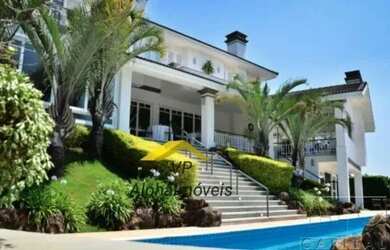 Imagem: A casa em condomínio possui 5 Dormitórios, 5 Banheiros, 5