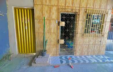 Imagem: A casa possui 2 Dormitórios, 2 Banheiros e está localizado