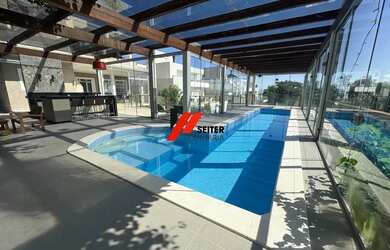 Imagem: A casa em condomínio possui 4 Dormitórios, 4 Banheiros, 4