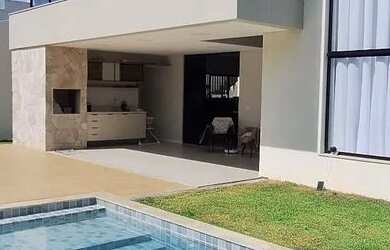 Imagem: A casa em condomínio possui 4 Dormitórios, 5 Banheiros, 2