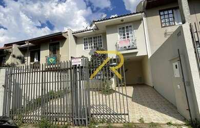 Imagem: A casa possui 3 Dormitórios, 2 Banheiros, 2 Vagas na garagem