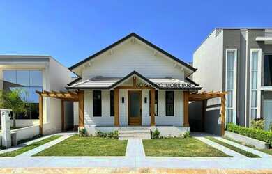 Imagem: A casa em condomínio possui 3 Dormitórios, 4 Banheiros, 2