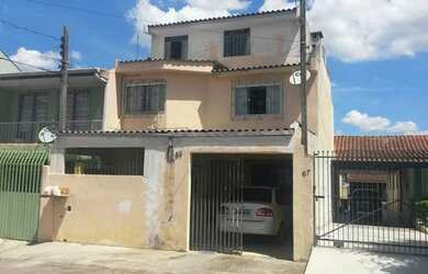 Imagem: A casa possui 3 Dormitórios, 2 Banheiros, 1 Vaga na garagem