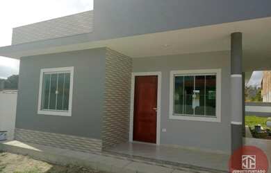 Imagem: A casa e possui 2 Dormitórios, Suítes, 2 Banheiros, 1 Vaga