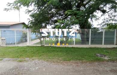 Imagem: A casa possui 5 Dormitórios, 3 Banheiros, 1 Vaga na garagem