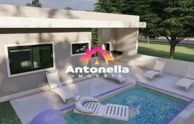 Imagem: A casa possui 2 Dormitórios, 1 Banheiro, 2 Vagas na garagem