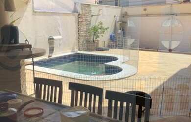 Imagem: A casa em condomínio possui 3 Dormitórios, 4 Banheiros, 2