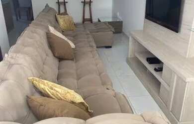 Imagem: A casa possui 3 Dormitórios, 2 Vagas na garagem e está localizado