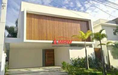 Imagem: A casa em condomínio possui 4 Dormitórios, 5 Banheiros, 4