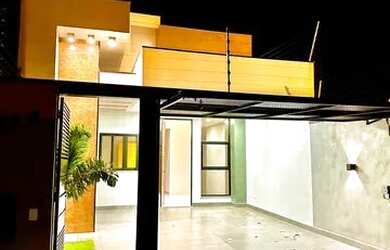 Imagem: A casa possui 3 Dormitórios, 2 Banheiros, 2 Vagas na garagem